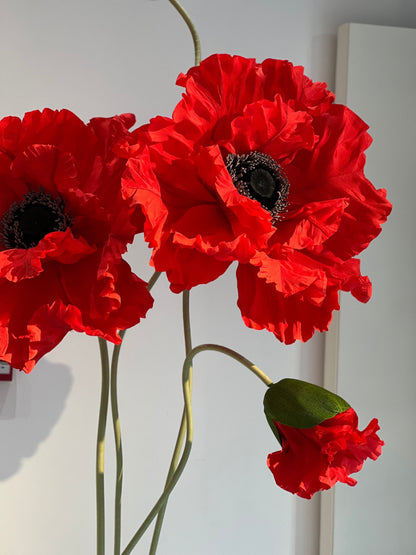 Betoverende rode papieren bloemen