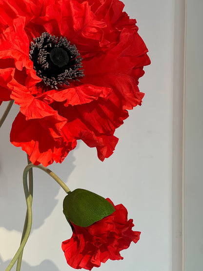Betoverende rode papieren bloemen